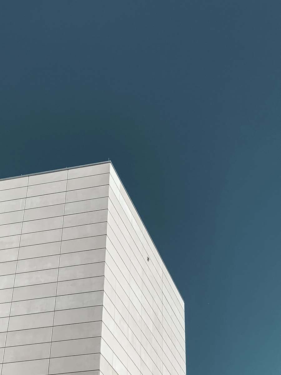 office building white building facade building